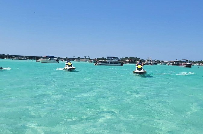 2 Passenger Jet Ski Dolphin Tour from Gilligan’s Watersports - Crab Island, sharks, and stingrays