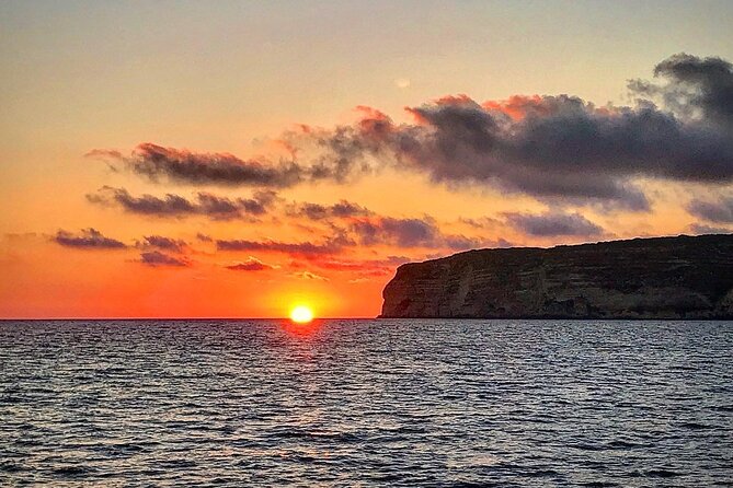 3-Hour Dolphin watching at sunset with aperitif - A swim in the dark beneath the stars
