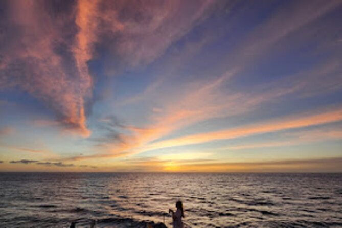 All-Inclusive Sunset Dolphin Watch and Snorkeling Cruise - Snorkeling in warm water with supplied equipment
