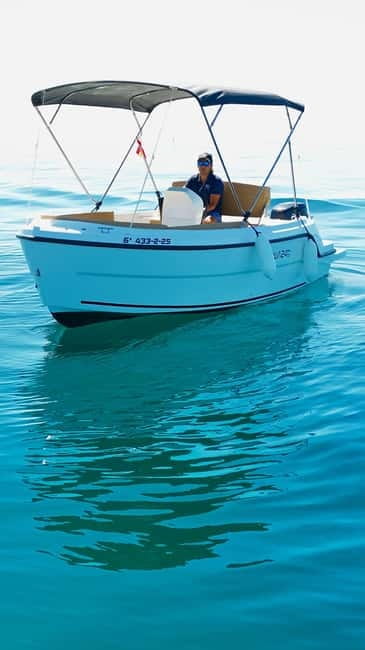 Benalmádena: license-Free Rent Boat for Dolphin Watching - Swimming, snorkeling, and a floating picnic