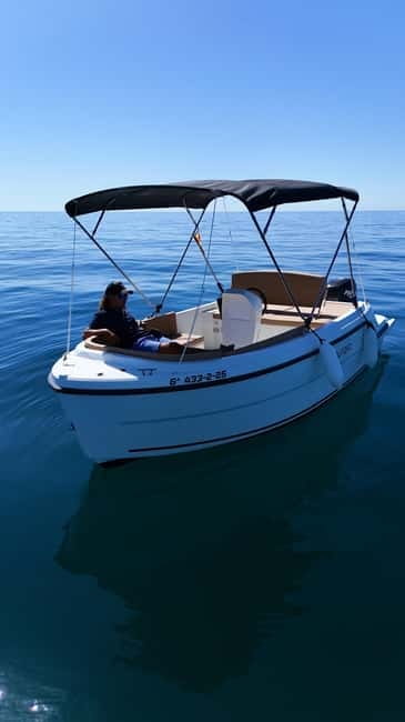 Benalmádena: license-Free Rent Boat for Dolphin Watching - Sunset, music, and the best use of a romantic booking