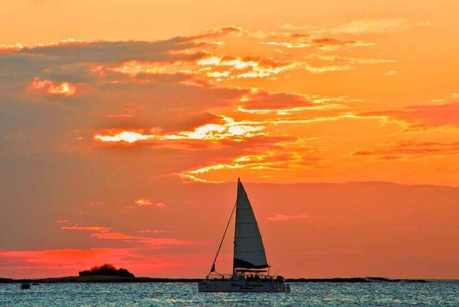 Blue Dolphin Catamaran Snorkeling Sunset Cruise from Tamarindo - Swimming and snorkeling near Playa Huevo