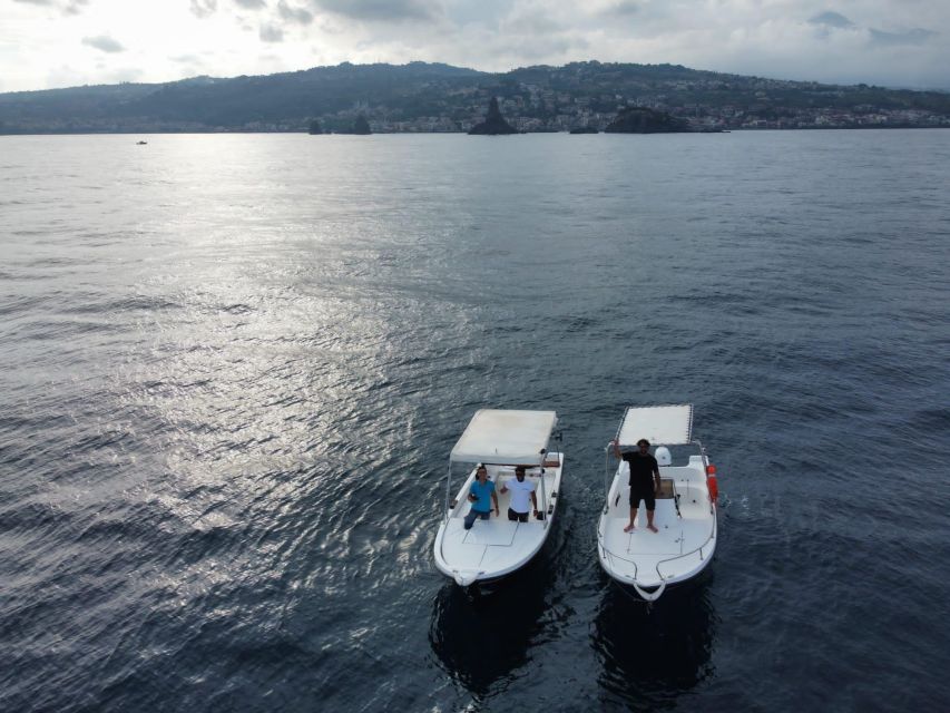 boat tour exploring and searching for dolphins in Acitrezza - Key points before you book
