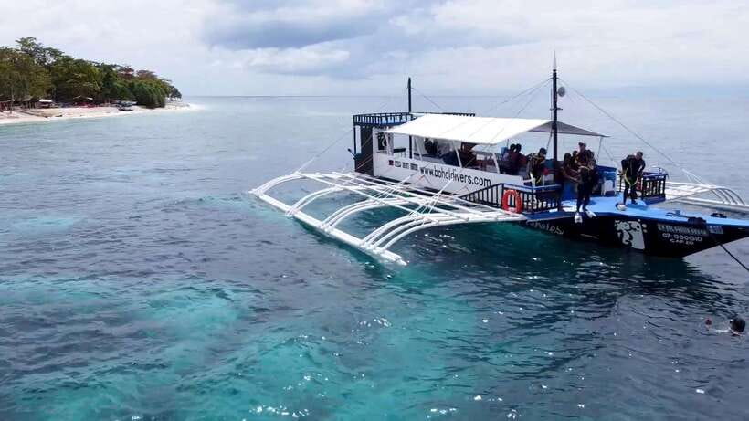 Bohol: Dolphin Watching & Snorkeling at Balicasag Island - Searching for dolphins near Balicasag