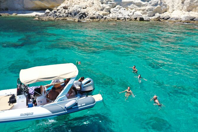 Cagliari Boat Tour 4 Stops .Possible Sighting of Dolphins - Calamosca Beach gives you a proper swim