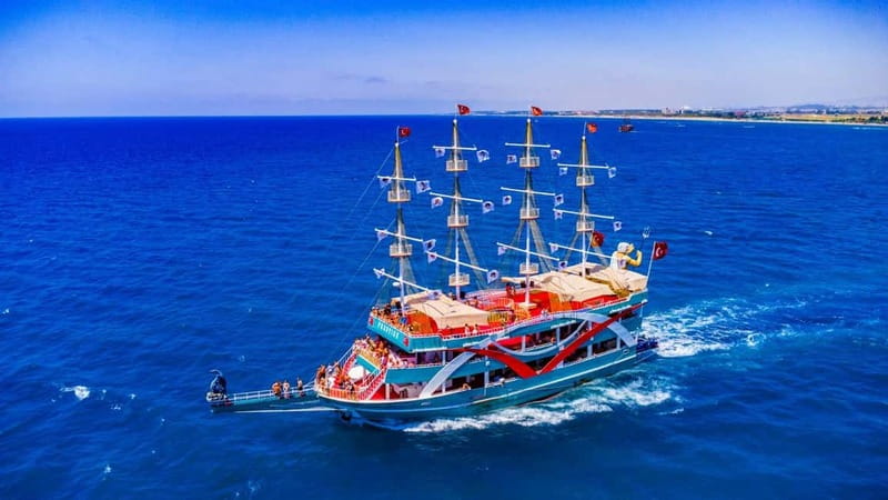City Of Side: Dolphin Island Boat or Side Boat Tour Options - Boarding a three-deck boat at Manavgat