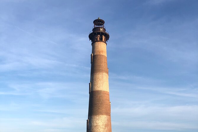 Dolphin Boat Tour from Folly Beach to Morris Island - The Morris Island Lighthouse from the water