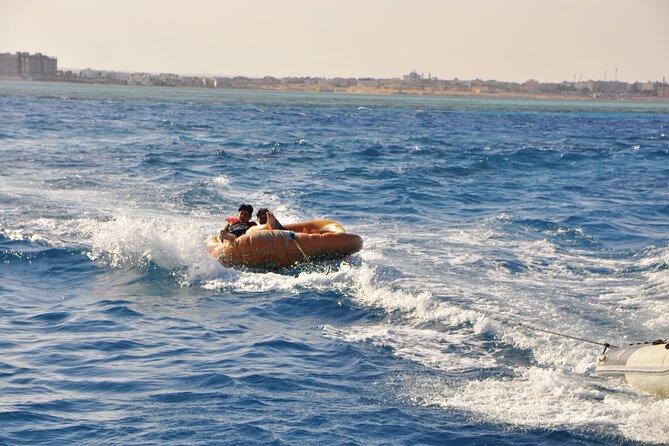 Dolphin House Cruise with water sports and Lunch in Hurghada - Two snorkeling stops in the Red Sea