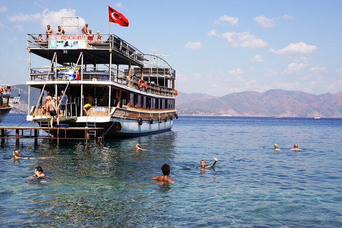 Dolphin Island Boat Trip – Swim, Sun & Lunch Included - Crew, language, and the feel onboard