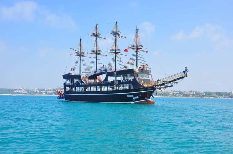 Dolphin Island Boat Trip with Swimming & Lunch - Swimming breaks and possible dolphin sightings