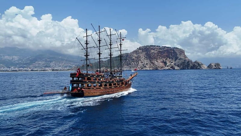 Dolphin Island Boat Trip with Swimming & Lunch - Drinks, photos, and extra costs