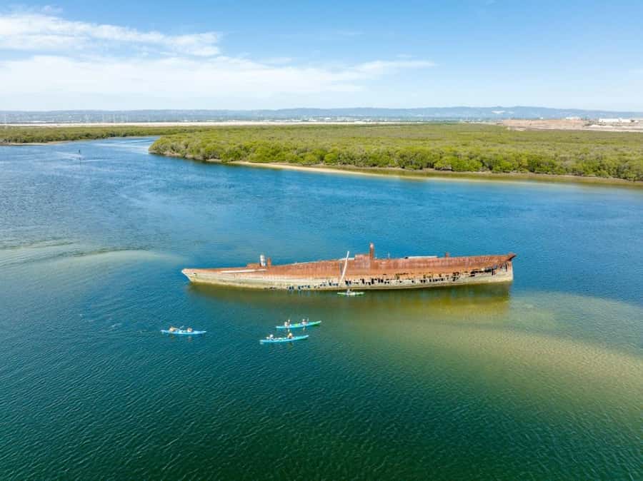 Dolphin Sanctuary and Ships Graveyard Kayak Tour - Paddling into the mangrove creeks