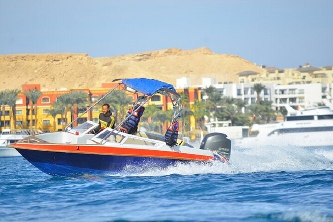 Dolphin Snorkel With private Speed Boat & Water Sports - Hurghada - Two snorkeling stops, coral, fish, and a shipwreck