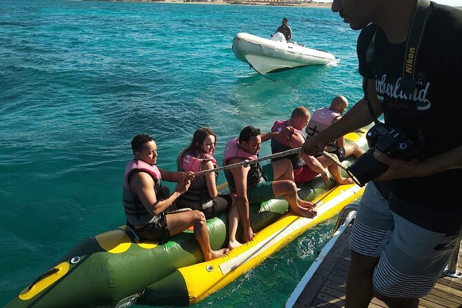 Dolphin tour & banana boat fun with snorkeling from Hurghada - Banana boat and sofa boat fun