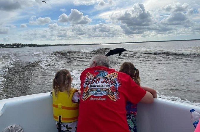 Dolphin Watching aboard the Cold Mil Fleet - Watching dolphins from the bow