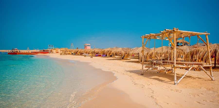 From Hurghada: Hula Hula Island Speedboat Tour with Dolphins - Coral reefs, fish, and the snorkeling stop