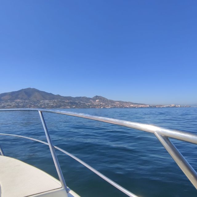 Fuengirola: Fantastic Dolphin Watching Yacht Tour with Drink - Leaving Puerto de Fuengirola for open water