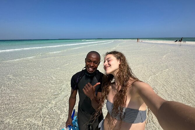Full Day Dolphin Watching with Snorkeling in Wasini - Guides, safety, and group size