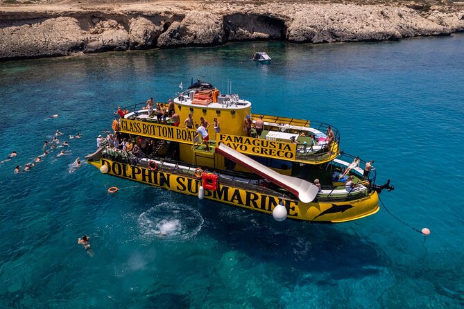 Glass Bottom Boat Dolphin Cruise to Blue Lagoon and Turtle Cove - Blue Lagoon: The Main Swim Stop