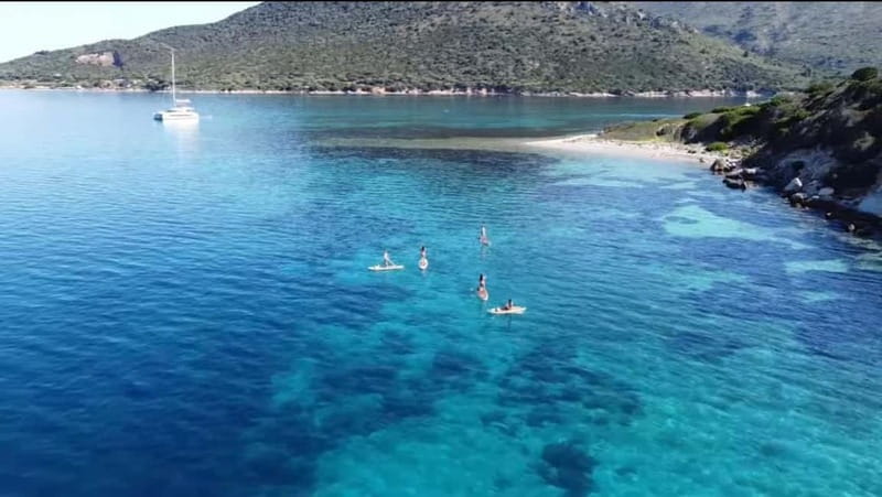 Golfo Aranci tour SUP Paddleboard Dolphin watching, aperitif - Finding the meeting point near Cala Moresca