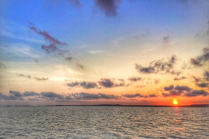 Hilton Head Dolphin Watching Cruise with Fireworks Display - Harbourtown Lighthouse and the changing evening light