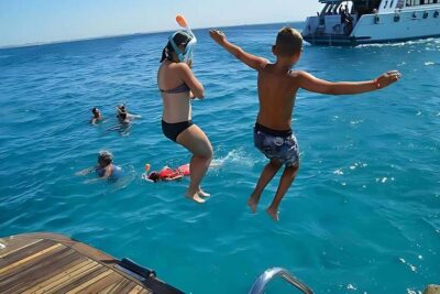 Dolphin Watching Boat Tour with Snorkeling & Lunch