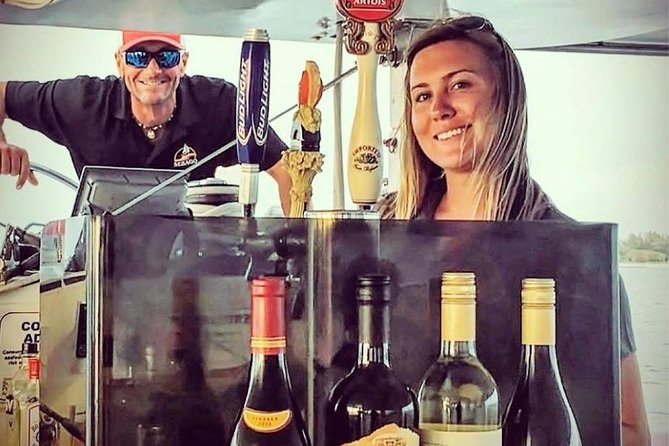 Key West Sunset Sail: Dolphin Watching, Wine, and Tapas - Mallory Square, Fort Zachary Taylor, and Sunset Key