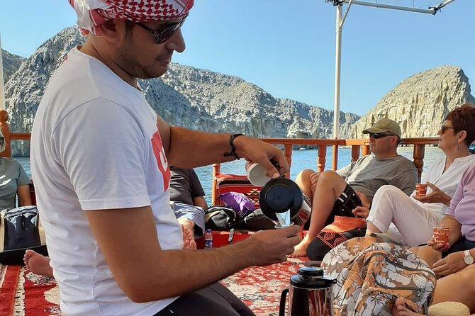 Khasab Dhow cruise-Half day with summing, dolphin watching - Coffee, dates, fruit, and onboard comfort