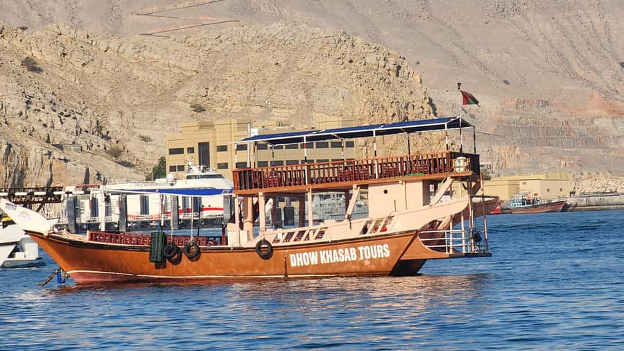 Khasab: Half-Day Dhow Cruise, Dolphin Watching, & Snorkeling - Setting out from Khasab in a traditional dhow
