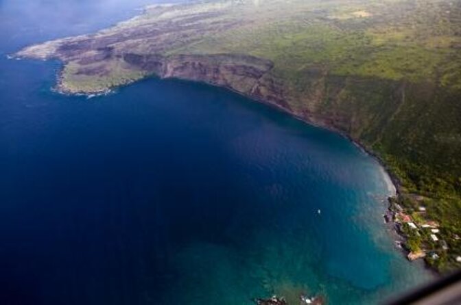 Kona Snorkel Tour: Captain Cook Reef Snorkel, Dolphin & Sea Caves - A small boat from Kailua-Kona to Captain Cook country