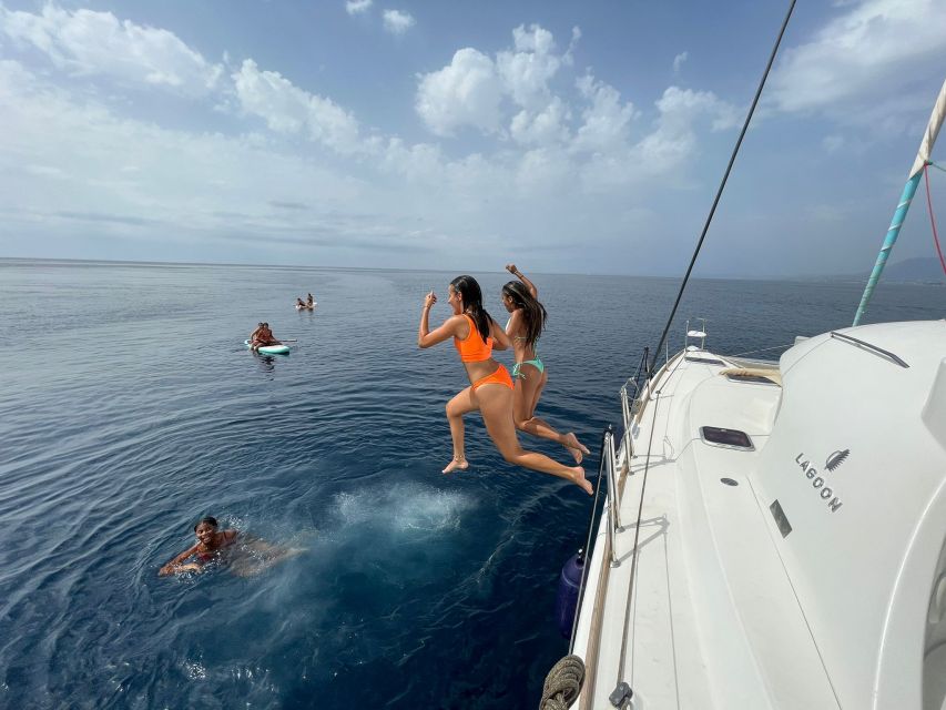 Marbella: Group Dolphin Watching Catamaran Tour with Snacks - Swimming, paddleboarding, and kayaking
