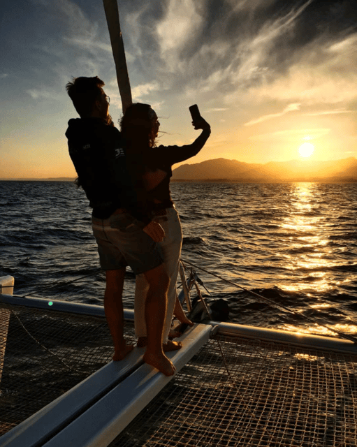 Marbella: Group Dolphin Watching Catamaran Tour with Snacks - Snacks, drinks, and the social mood