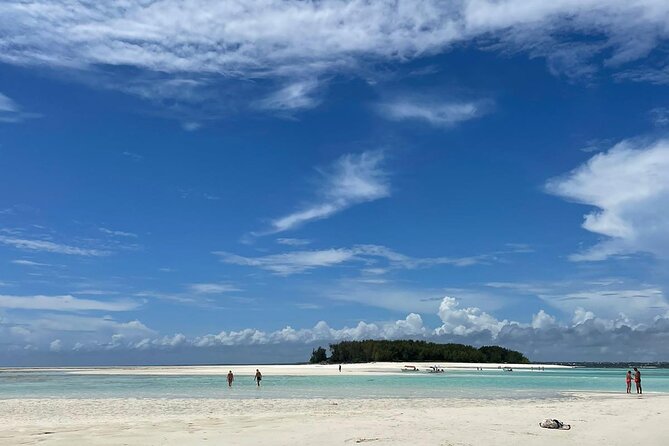 Mnemba Island Dolphin Tour and Stonetown Walking Tour - Mnemba Island: four hours by white sand and clear water