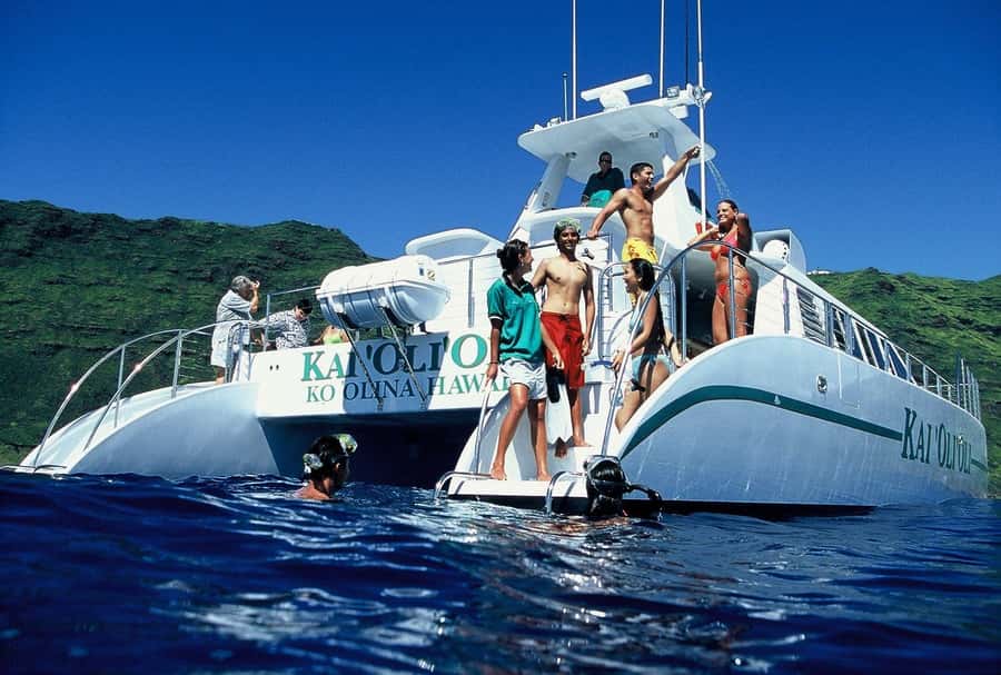 Oahu: Snorkeling & Dolphin Watch Cruise w/ Luau Style Buffet - Following Oahu’s Waiʻanae coast by catamaran