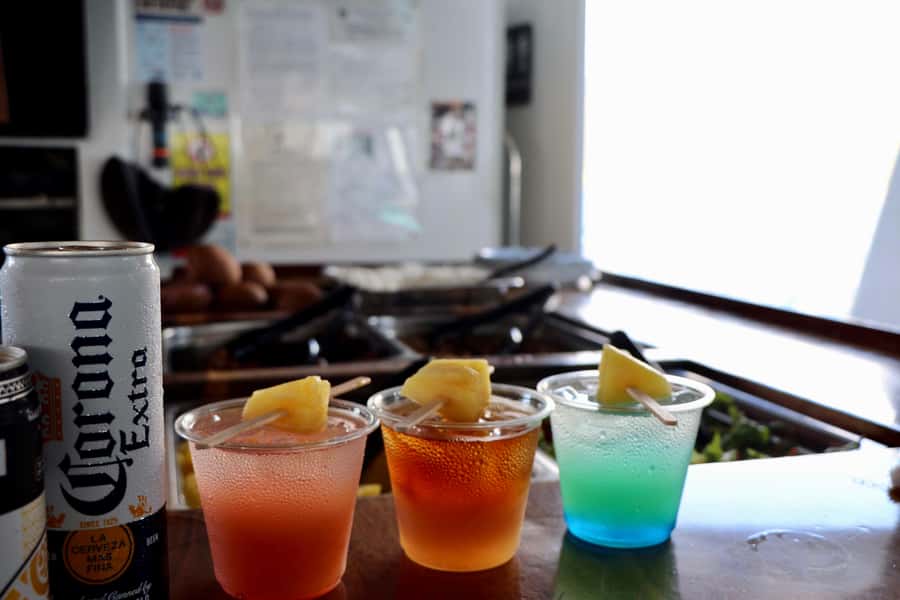 Oahu: Snorkeling & Dolphin Watch Cruise w/ Luau Style Buffet - A Hawaiian buffet served at sea