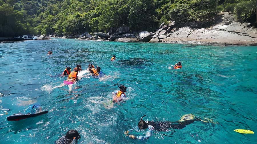 Phuket: Raya Island, Maithon Island, & Dolphin Spotting Tour - Maithon Island and the dolphin search