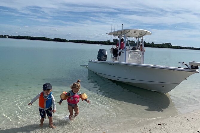 Private boat offering dolphin watching, island excursions and nature tours - Swimming, Snorkeling, and Optional Fishing