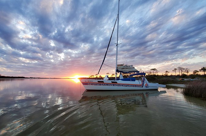 Private Catamaran Sunset Cruise with Dolphin watching - Captain Kip and the Tone of the Cruise