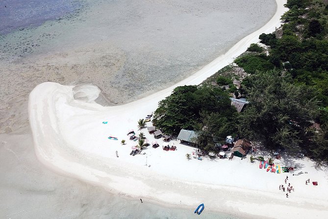 Private Full-Day Red Dragon Yacht for Snorkeling Koh Tan & Visit Pink Dolphin - Koh Tan snorkeling, with a useful visibility warning
