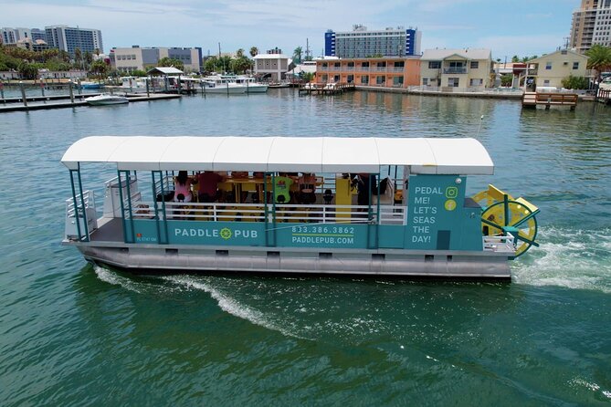 Private Party Boat to Island Hop, Dolphin Watch, and Swim - Waterfront celebrity homes from the boat