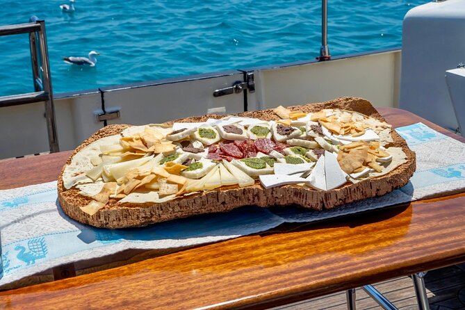 Private Tour with Historic Tugboat: Tavolara, Molara, Dolphins - Tavolara: swimming beside an island of stories