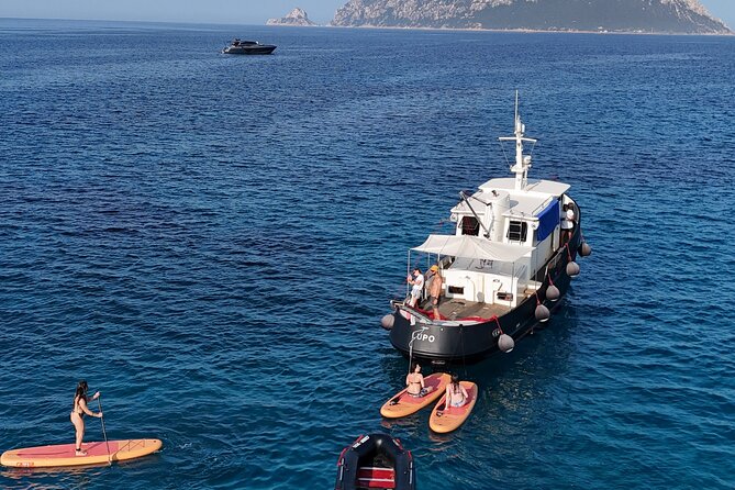 Private Tour with Historic Tugboat: Tavolara, Molara, Dolphins - Andrea, Federica, and the tone on board