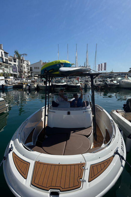 Puerto Banús: Private Cruise with Dolphins & Wakeboard - Wakeboarding with the Costa del Sol in view