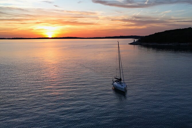Pula: Private Golden Hour Sail - Dolphins, Drinks & Brijuni Views - Dolphin watching with a no-chase policy