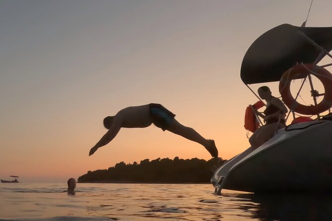 Pula: Private Golden Hour Sail - Dolphins, Drinks & Brijuni Views - Following Pula’s coast toward Brijuni