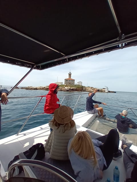 Rovinj: Sunset & dolphin group tours with Catamaran - Searching for dolphins along the Rovinj coast