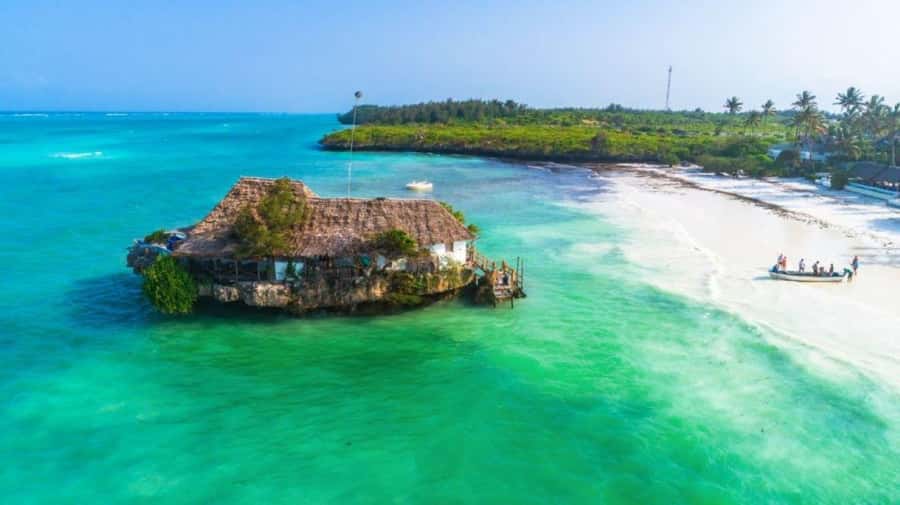 Salaam Cave Tour, Lunch at The Rock, Mnemba Dolphin Tour - Starting with Zanzibar’s white sand at Paje