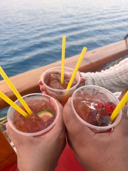 Side Dolphin Island Boat Trip with Lunch & Swim Stops - Starting the day with a Side hotel pickup