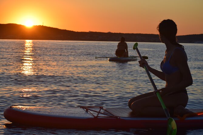 Stand Up Paddle With Dolphins, aperitif and pictures - Cala Moresca for swimming and a slower pace