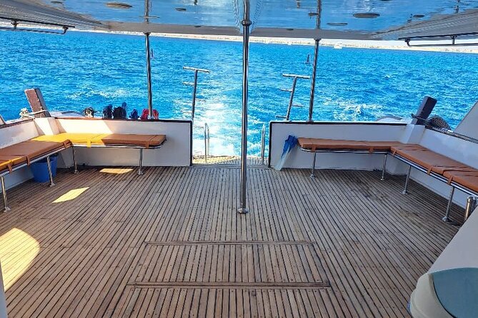 Swim with Dolphin Boat Trip with Snorkeling and Transfer Hurghada - Lunch, drinks, and a banana boat ride